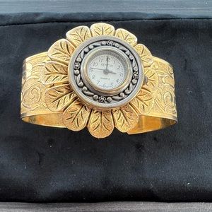 Three vintage watches and oversized earrings